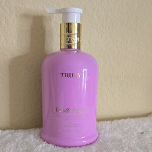 TRULY Smooth Legend Lotion in Pink with Gold Accents